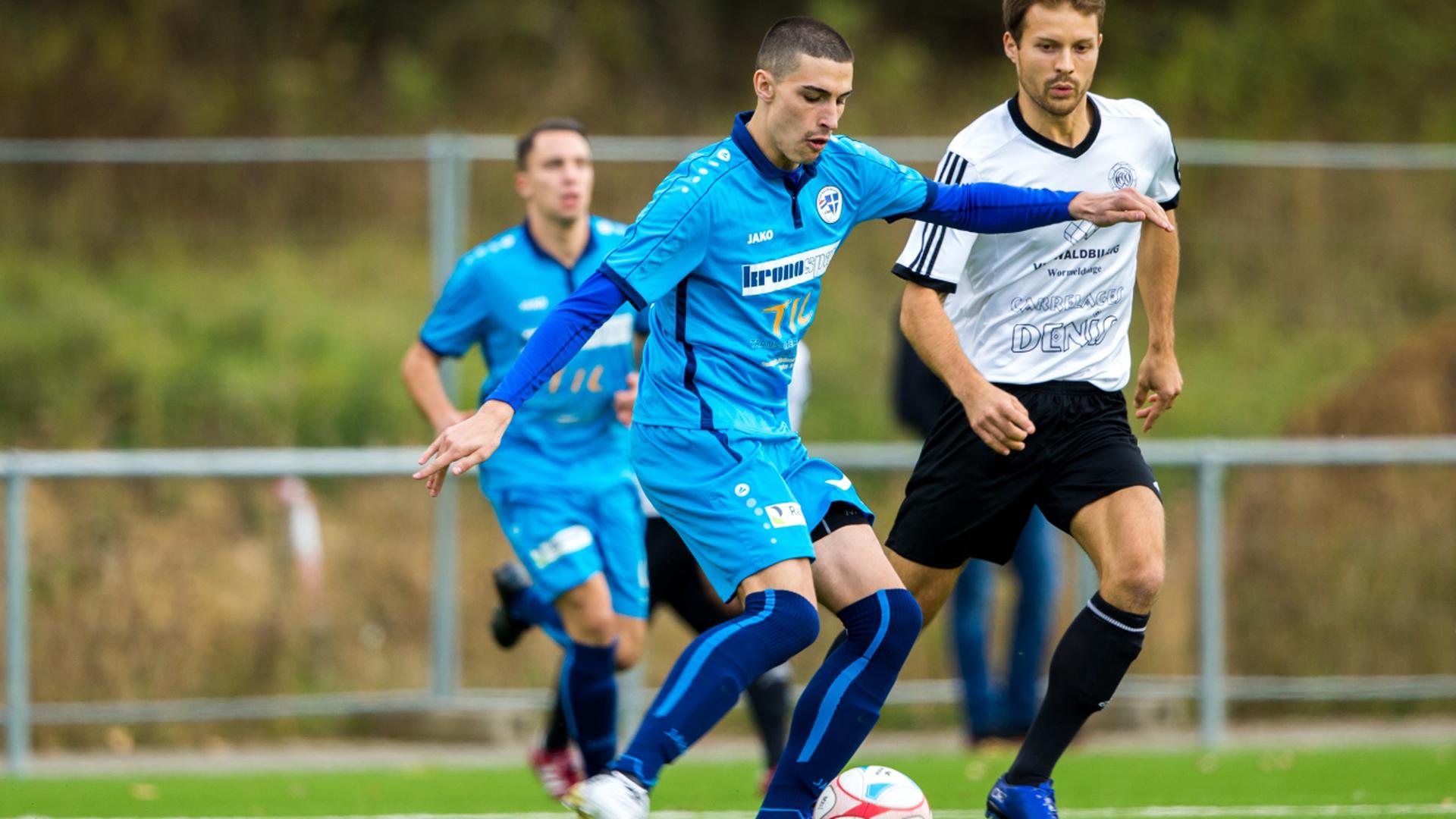 Sanem (en bleu) - Wormeldange 3-1 - Cédric Gorjao Camarate et Michal Jerzy Mroch.