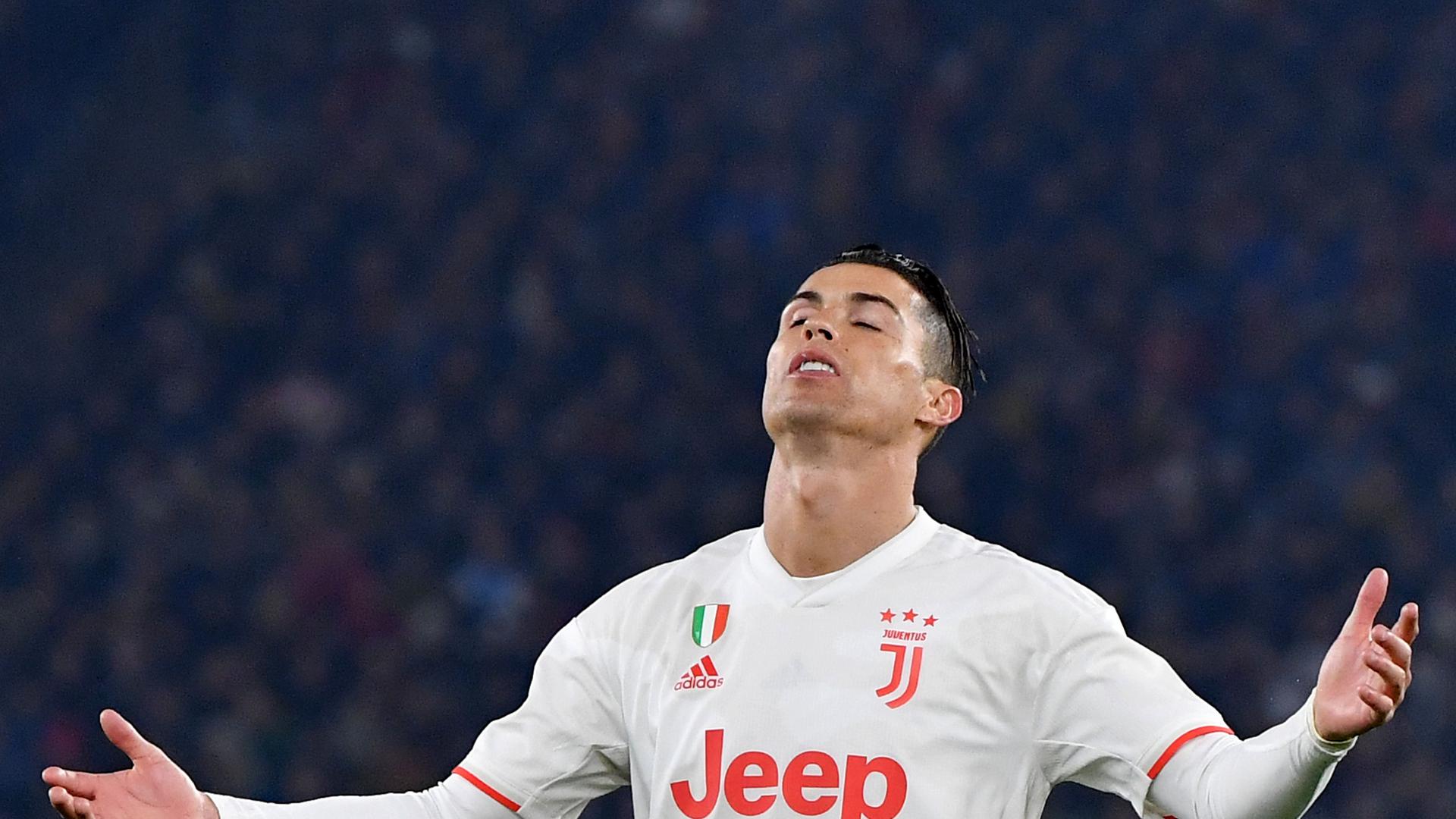 Juventus' Portuguese forward Cristiano Ronaldo reacts during the Italian Serie A football match AS Roma vs Juventus on January 12, 2020 at the Olympic stadium in Rome. (Photo by Andreas SOLARO / AFP)