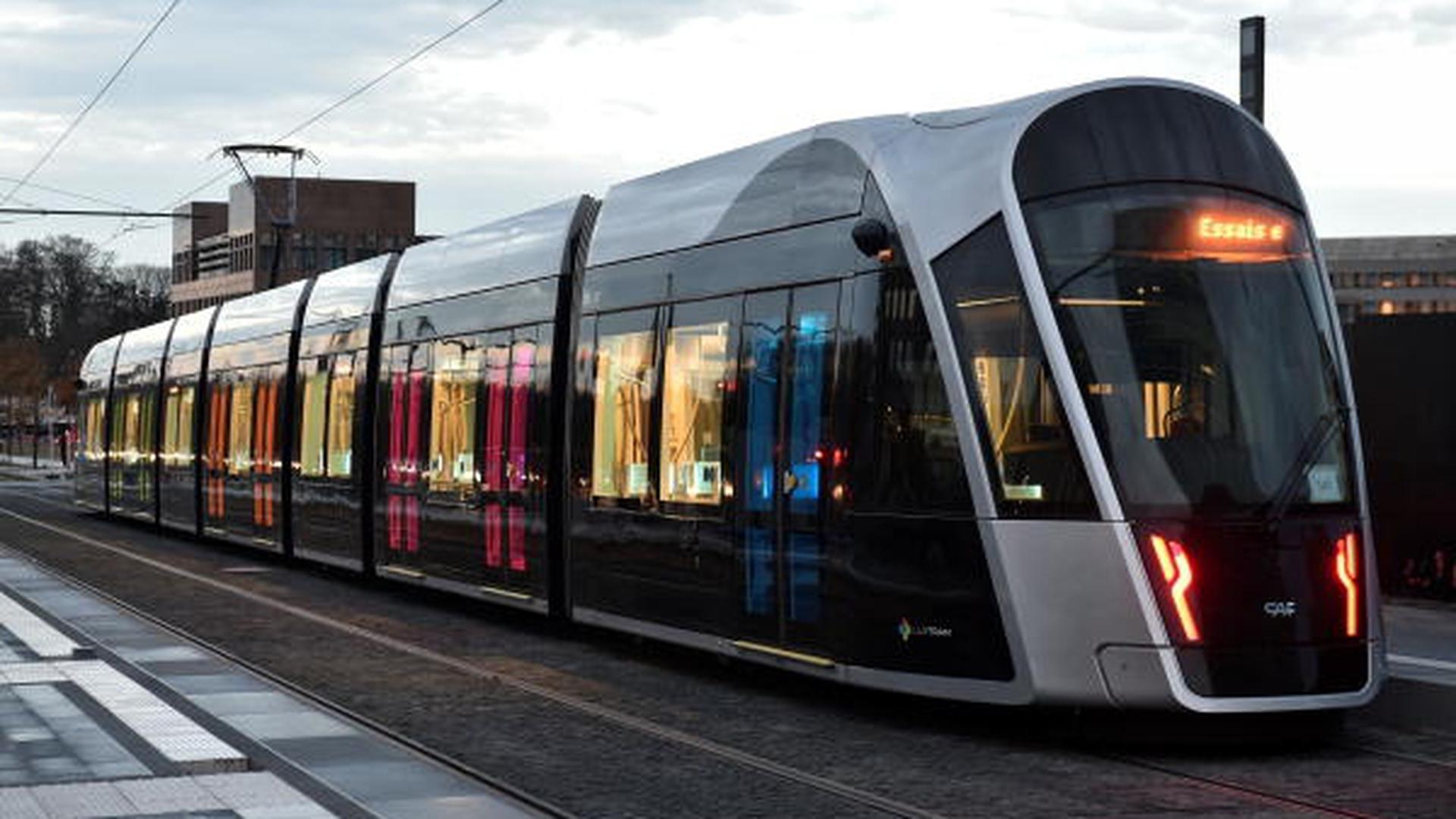 A tram of the Luxtram company, is pictured in a street of Luxembourg on November 24, 2017 ahead of its official inauguration on December 10, more than 60 years old after the tram service was removed in the city.  / AFP PHOTO / JOHN THYS