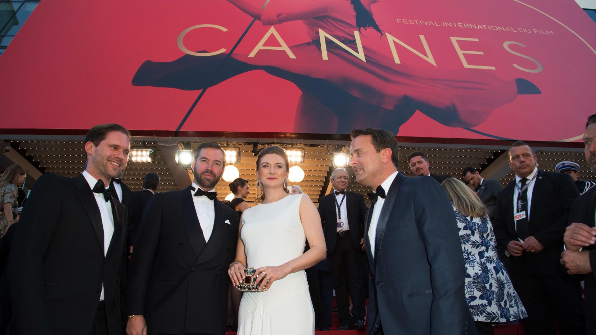 Their Royal Highnesses, Prince Guillaume, Grand Duke of Luxembourg, Princess Stephanie, Grand Duke of Luxembourg, Prime Minister of Luxembourg, Xavier Bettel and Gauthier Destiny attend at the opening ceremony for the screening of the film "Les fantomes d'Ismael" (Ismael's Ghosts) out of competition at the 70th Cannes Film Festival of Cannes on May 16, 2017 in Cannes, France. 


