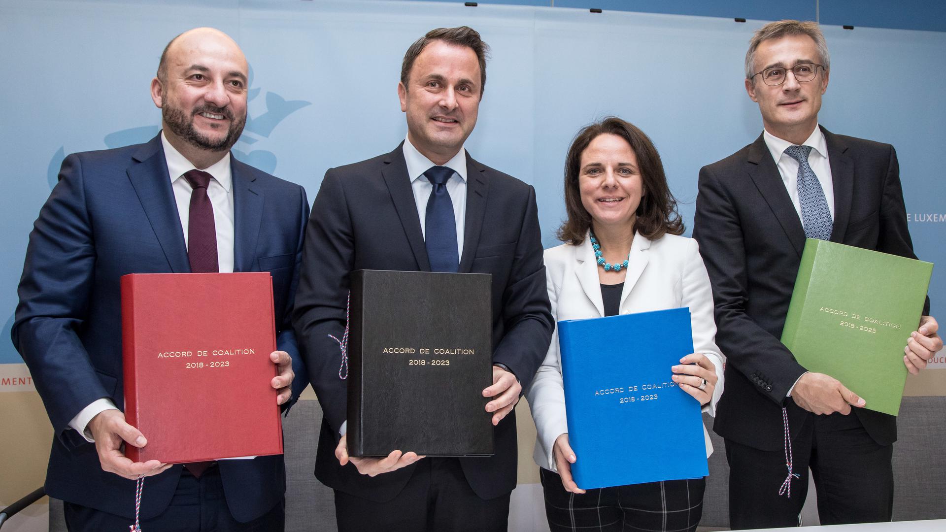 IPO , Unterzeichnung Koalitionsabkommen DP , LSAP , Dei Greng , Gambia , vlnr Etienne Schneider , Xavier Bettel , Corinne Cahen , Felix Braz Foto:Guy Jallay/Luxemburger Wort