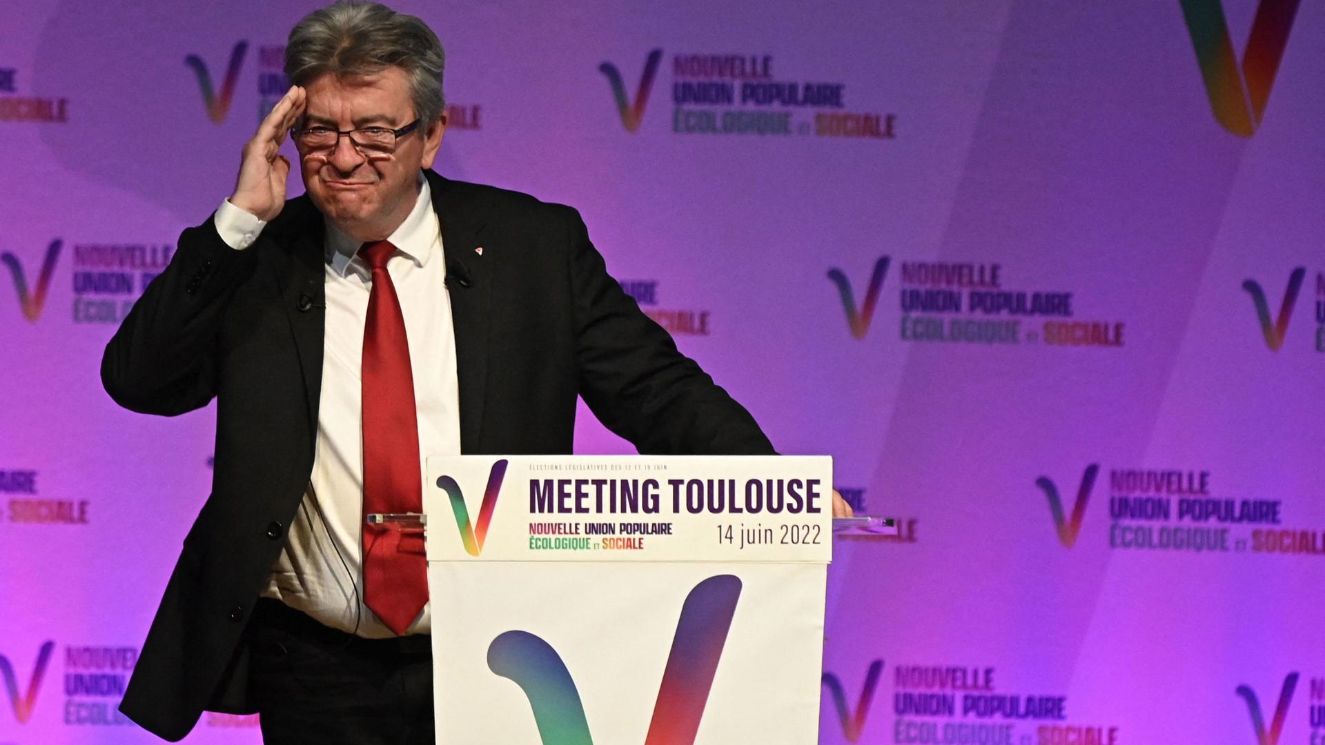 France's leftist La France Insoumise (LFI) party leader, Member of Parliament and leader of left-wing coalition Nupes (Nouvelle Union Populaire Ecologique et Sociale - New Ecologic and Social People's Union) Jean-Luc Melenchon delivers a speech as part of a campaign meeting in Toulouse, southwestern France, on June 14, 2022. (Photo by Lionel BONAVENTURE / AFP)