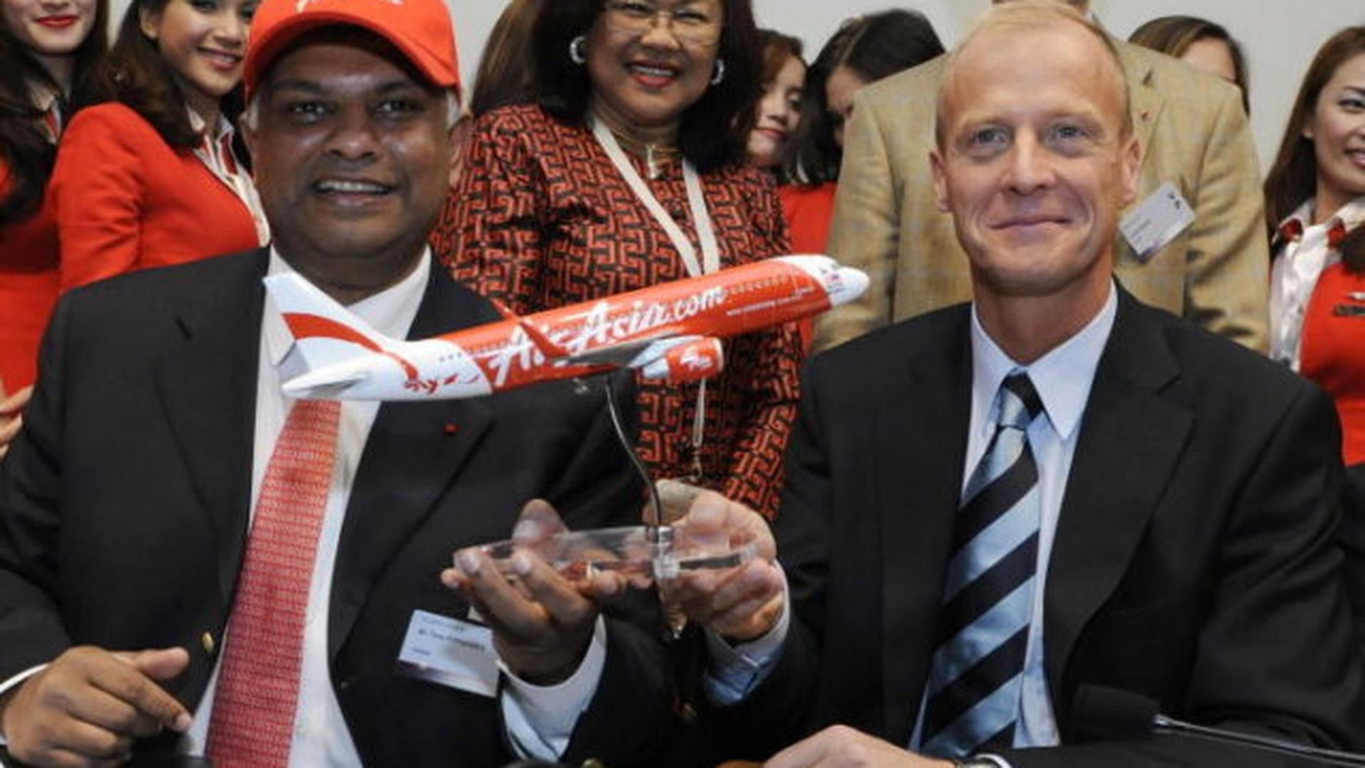 Tom Enders (Airbus) et le patron d'AirAsia